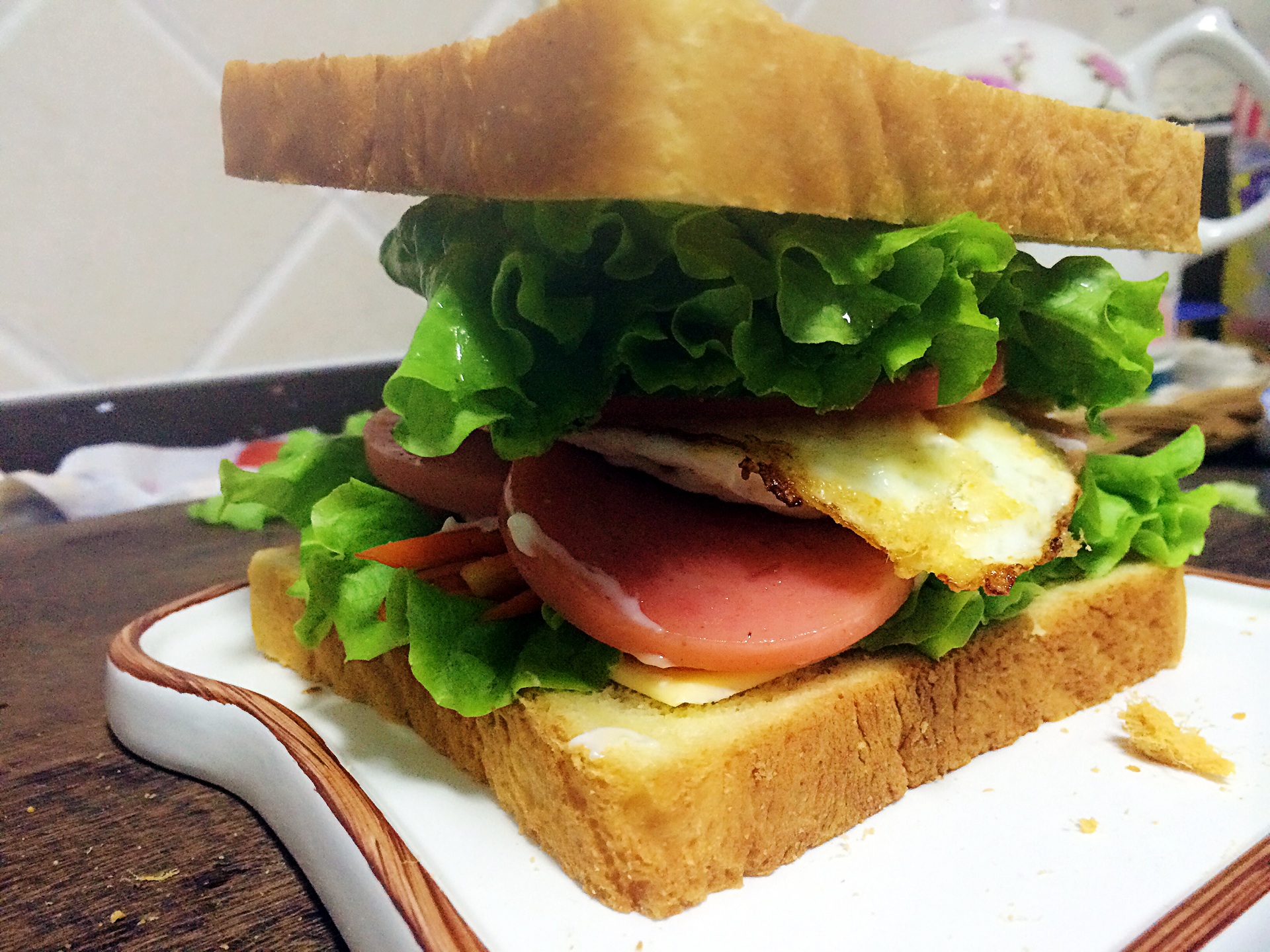 苹果(AAPL.US)通过AI推动新战略:桌面机器人引领2027计划,智能家居摄像头开启增长新机遇